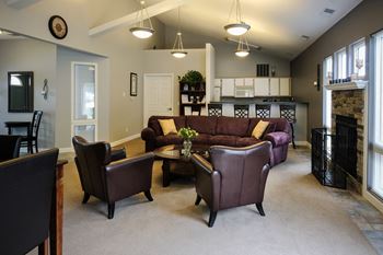 spacious clubhouse, upgraded furniture, kitchen space, small rental for guests, at regency apartments in Bettendorf Iowa